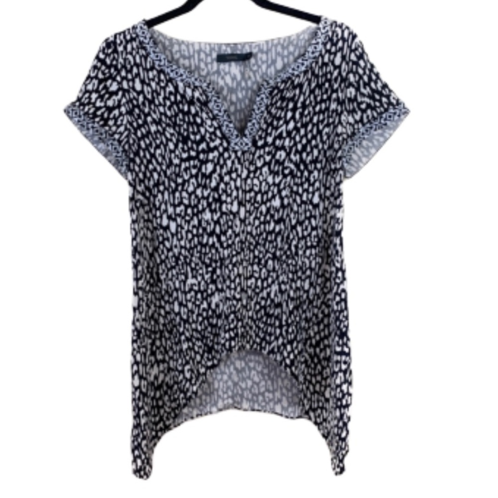 VICI asymmetrical hem tribal/animal v neck top